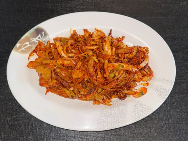Stir Fried Spicy Squid w/ Vegetables.